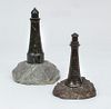 Two Marble Lighthouses on Stone Bases