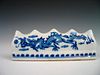 Chinese blue and white porcelain brush rest, dragon decoration.