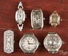 Six ladies wrist watches, no bands, to include gold cases, platinum covered with diamonds