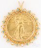 14K yellow gold pendant with gold coin
