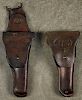 Two WW I era leather 1911 holsters, one stamped S & R JPC, the other unmarked.