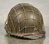 WW II helmet, with mesh cover.