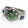 3.78 Carat Old European Cut Green Diamond and Platinum Ring with Sapphire Accents.