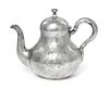 * A Russian Silver Teapot, Garvil Grachev, St. Petersburg, 1887, of baluster form with loop handle and scroll spout, engraved on