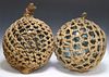 (2) LARGE HAND BLOWN COLORED GLASS NETTED FISHING FLOATS