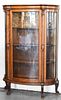 ANTIQUE OAK CURVED FRONT CHINA CABINET