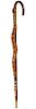 327. Folk-Art Snake Cane – Ca. 1978 – A crutch handle hickory cane with a large paint decorated and carved snake, cane is