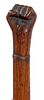 330. Fist Folk-Art Cane – Ca. 1880 – A carved single clinched fist with a copper collar American oak shaft and a metal fe