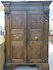 Large Italian armoire having two carved doors flanked by carved columns, 18th century. ht. 84in., wd. 59in., dp. 30in.