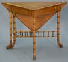 Maple faux bamboo handkerchief drop leaf table with turned legs and stretcher base, attributed to Horner.