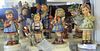 Group of eleven Goebel Hummel figures, 4 with original box. ht. 5in. to 6in.