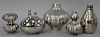 Five piece lot to include Jonathan Adler couture aorta vase with two valves in silver finish, molasses lantern vase, two doub