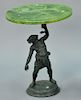Bronze standing Goddess figure holding a snake made into a stand with round top. ht. 24in., dia. 19in.