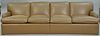 Two part brown leather sofa (worn). lg. 114in.