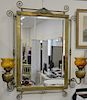 Large Victorian brass framed mirror having mounted oil lamp sconces with glass shades. ht. 49in., wd. 37in. plus adjustable a