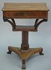 Regency style mahogany sewing stand having lift top with inlaid conch shell, opening to fitted interior, line inlaid on pedes
