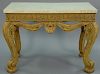 Maitland Smith center hall table having veneered marble top over skirt with carved Greek key design over cabriole legs with c