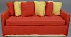 Charles Beckley custom upholstered day or trundle bed with red and yellow blended cotton felt upholstery and throw pillows. l