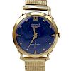 Man's Circa 1950s Longines Wittnauer 14 Karat Yellow Gold Watch with Blue Enamel Dial, Manual Movement and Twist on metal Bra