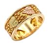 14K Yellow, Pink, and White Gold Band having Leaves and Deer Tracks Inside