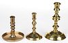 ASSORTED EARLY BRASS ROUND-BASE CANDLESTICKS, LOT OF THREE