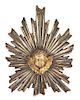 An Italian Carved Gilt and Silvered Wood Sunburst Applique Height 15 inches.
