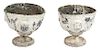A Pair of Continental Painted Lead Urns Height 9 x diameter 9 inches.
