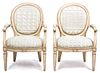 A Pair of Louis XVI Style Painted Fauteuils Height 40 x width 26 1/2 x depth 27 inches.