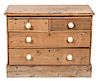 An English Pine Chest of Drawers Height 29 x width 37 1/2 x depth 17 inches.