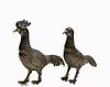 A Pair Of Pheasant Silver Figurines