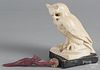 Carved and painted fox jagging wheel, 6 1/2'' l., together with a plaster owl, 7 1/4'' h.
