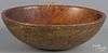 Turned and painted wood bowl with later ochre swirl decoration, 3 3/4'' h., 12 1/2'' dia.