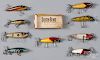 Nine South Bend wood fishing lures, to include five Nip-I-Diddee, one with the original box, two inj