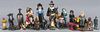 Group of cast iron paperweights, to include Amish figures, pilgrim, Native American Indian, etc., ta