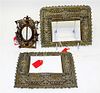 * A Pair of Spanish Baroque Style Pressed Brass Frames Each 7 x 8 7/8 inches.