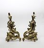 * A Pair of Louis XV Style Brass Chenets Height 17 inches.
