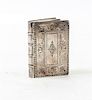 * A Silver Snuff Box, , in the form of a book with floral and volute chased covers.