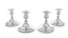 Four American Silver Candlesticks, Gorham Mfg. Co., Providence, RI, having an urn form cup with a knopped stem and a stepped 