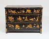 ITALIAN BAROQUE STYLE BLACK PAINTED AND PARCEL-GILT CHEST OF DRAWERS