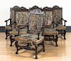 Set of six gothic style carved mahogany armchairs,