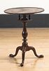Queen Anne mahogany candlestand, 18th c., 27 1/2"
