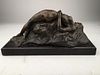 Bronze reclining nude mounted on a black marble base.<BR>Height 6 1/4 inches.