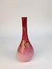 Peach blow porcelain vase with gold enameled flowers.<BR>Height9 7/8 inches.