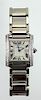 A Lady's 18K White Gold Cartier Tank Diamond Watch