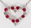 RUBY AND 0.90CT DIAMOND HEART FORM PENDANT NECKLACE