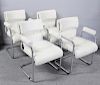 Set of 4 White Leather Mariani Dining Chairs.