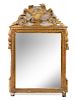 A Louis XVI Giltwood Mirror Height 34 3/4 x width 22 inches.