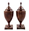 A Pair of George III Mahogany Cutlery Urns Height 24 inches.