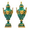 A Pair of Louis XV Style Gilt Bronze Mounted Malachite Urns Height 28 inches.