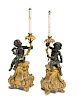 A Pair of Continental Gilt and Patinated Bronze Figural Candlesticks Height of bronze 17 1/2 inches.